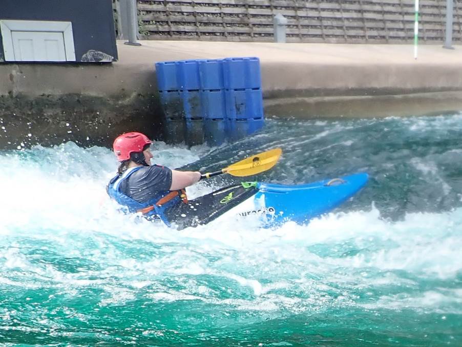 A person in a kayak
Description automatically generated with low confidence