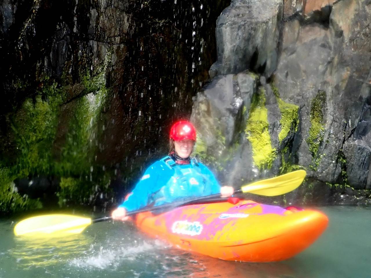 A person in a kayak in a river
Description automatically generated with low confidence