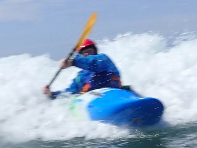 A picture containing water, outdoor, sport, blue
Description automatically generated