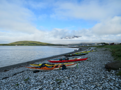 Canoes on a rocky beach

Description automatically generated with low confidence