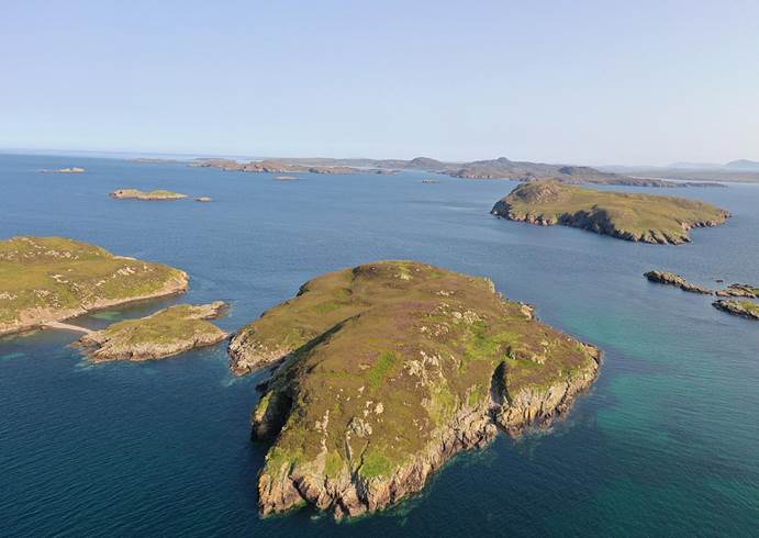 The island (pictured centre) measures just295 yards (270 metres) at its widest points and 530 yards (485 metres) at its longest