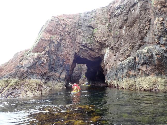 A picture containing rock, outdoor, mountain, water

Description automatically generated