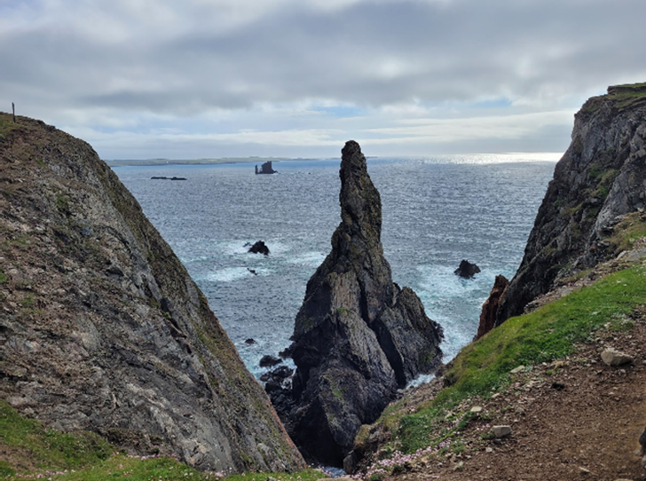 A picture containing sky, outdoor, mountain, rock

Description automatically generated