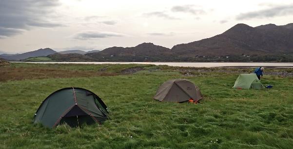 Tents in a grassy field

Description automatically generated