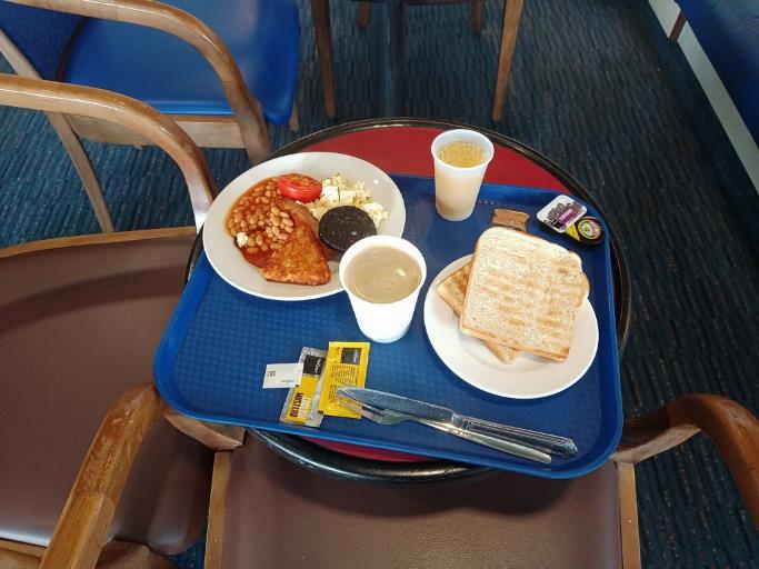 A tray with food on it

Description automatically generated