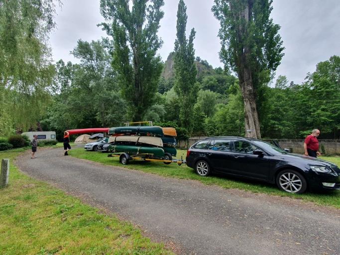 A picture containing outdoor, tree, vehicle, land vehicle

Description automatically generated