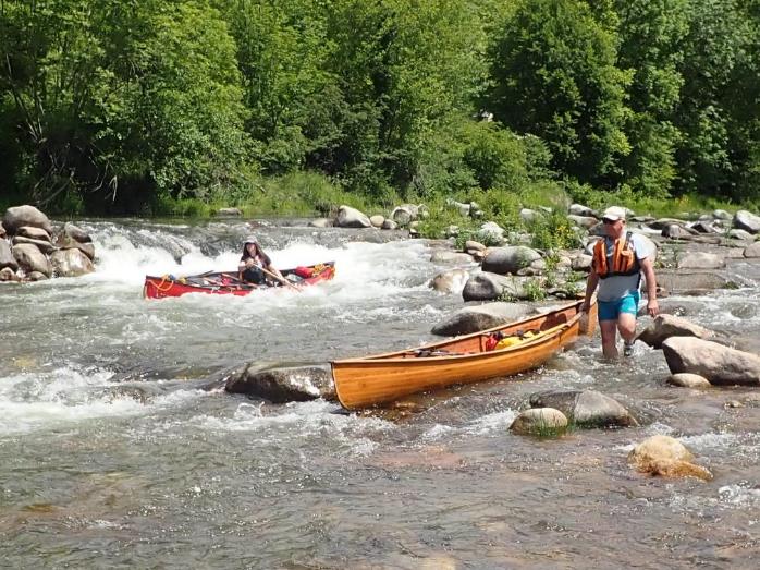 People kayaking in a river

Description automatically generated with low confidence