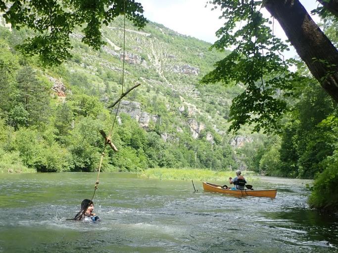 A picture containing outdoor, tree, water, paddle

Description automatically generated