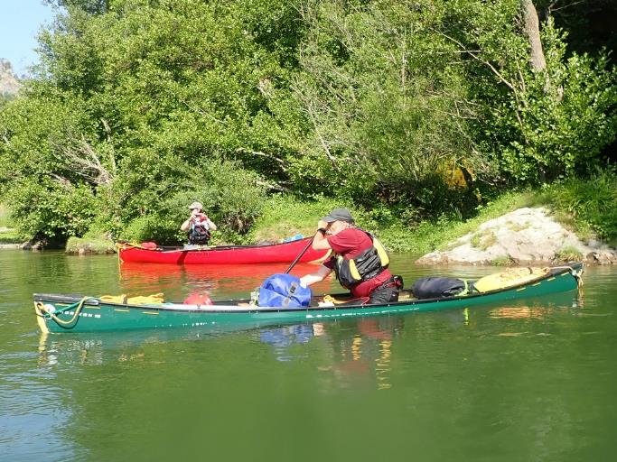A picture containing outdoor, watercraft, transport, tree

Description automatically generated