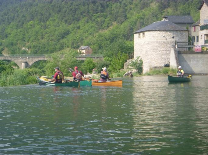 A group of people in canoes on a river

Description automatically generated with medium confidence
