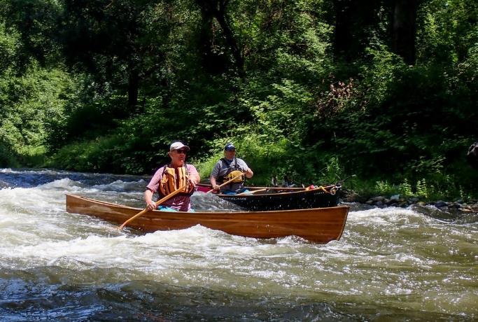 A picture containing outdoor, tree, watercraft, transport

Description automatically generated