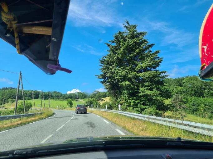 A car driving on a road

Description automatically generated with medium confidence