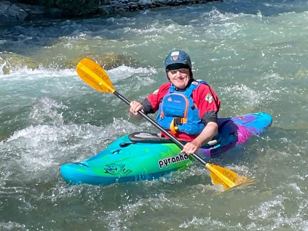 A person in a kayak
Description automatically generated