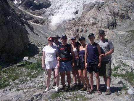 A group of people posing for a photo

Description automatically generated