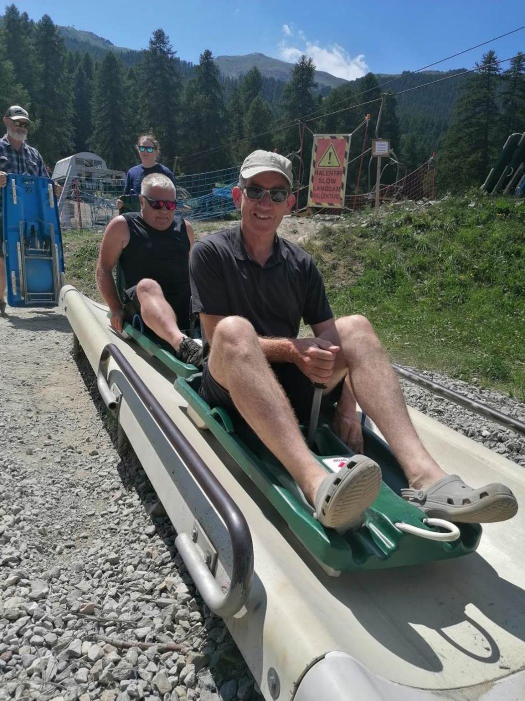 A person on a sled
Description automatically generated