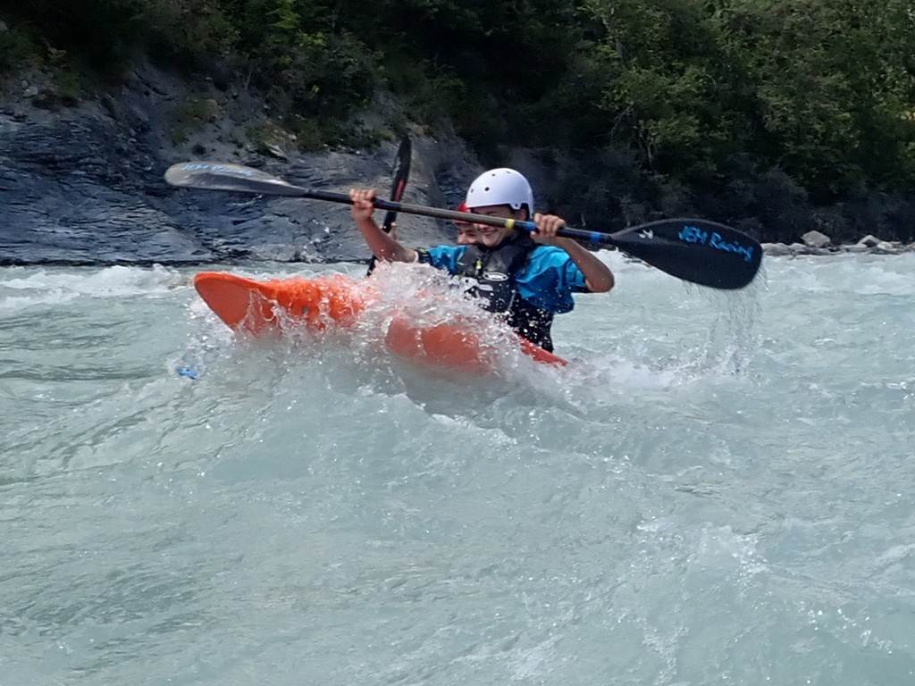A person in a kayak
Description automatically generated