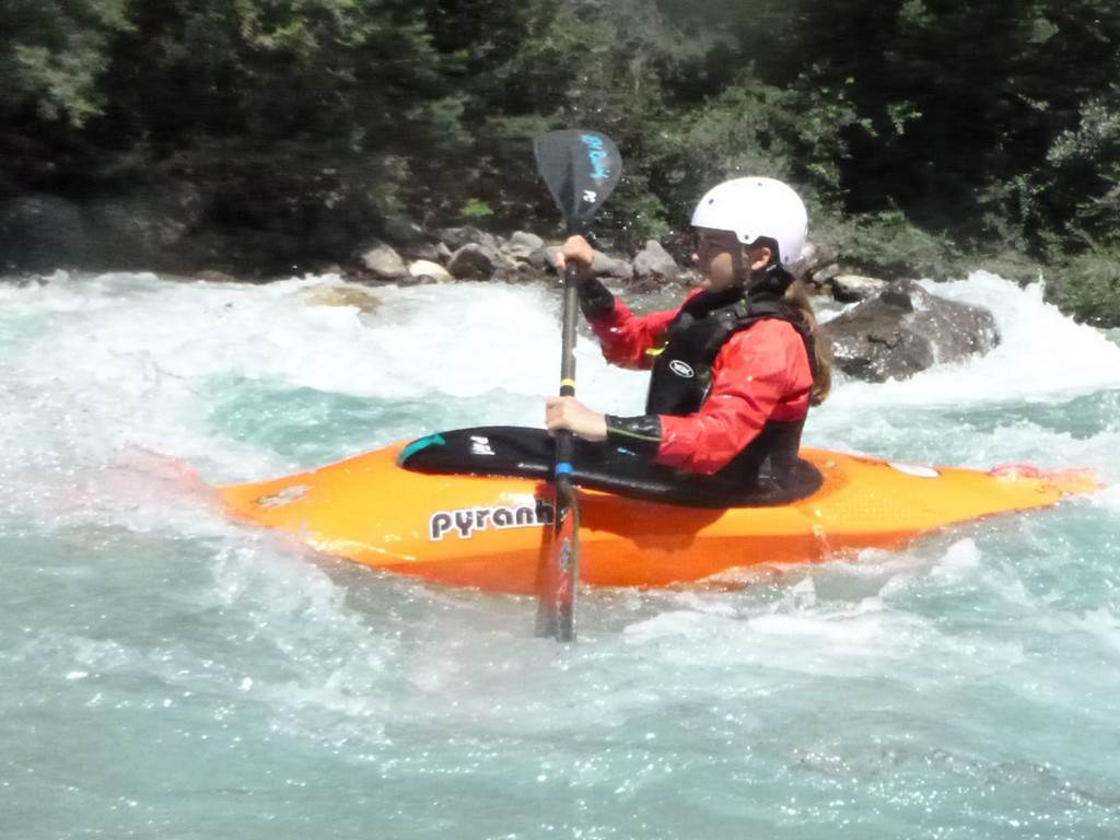 A person in a kayak
Description automatically generated